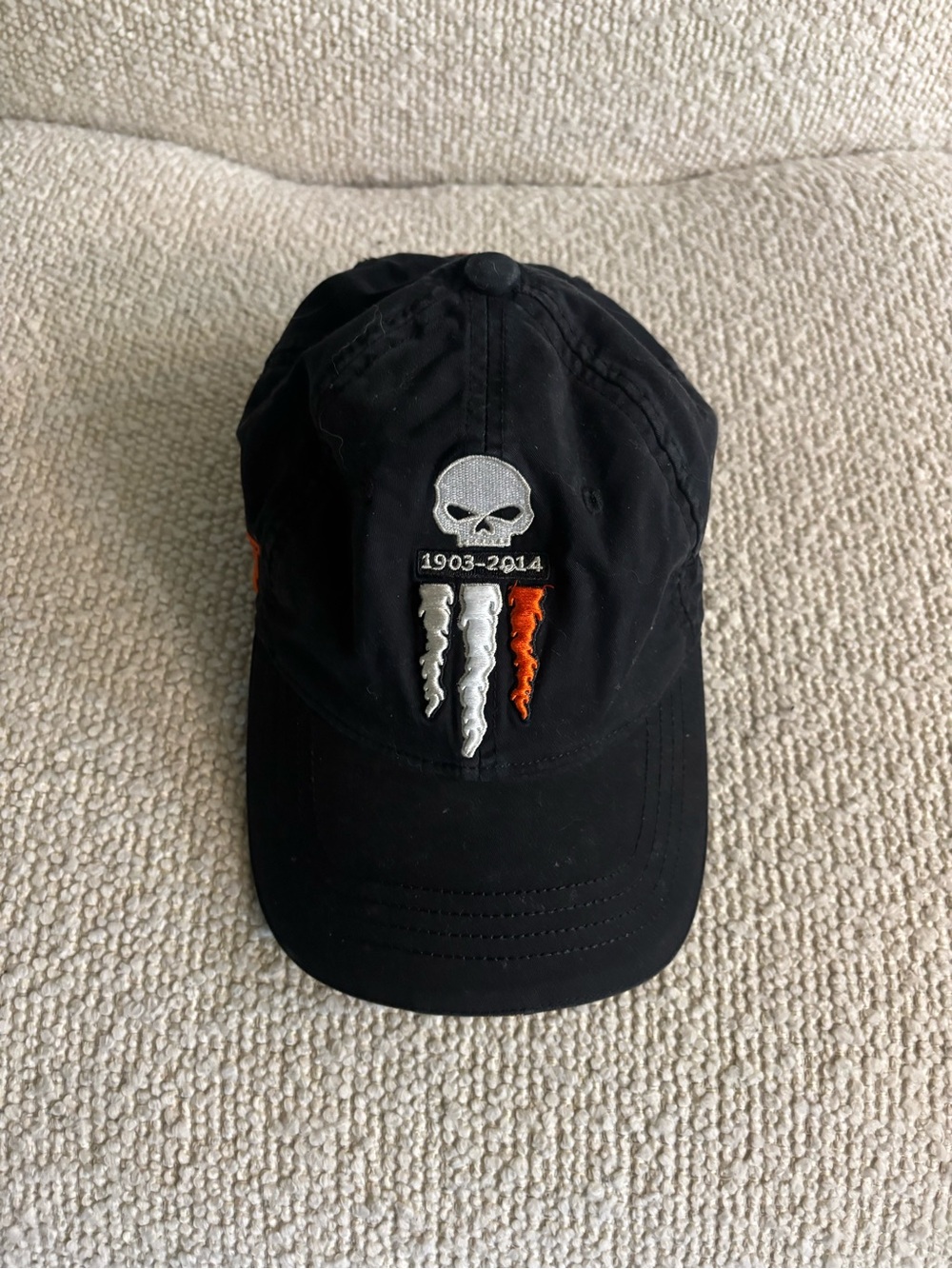 Harley-Davidson Black Cap with White and Orange Skull Claw Emblem